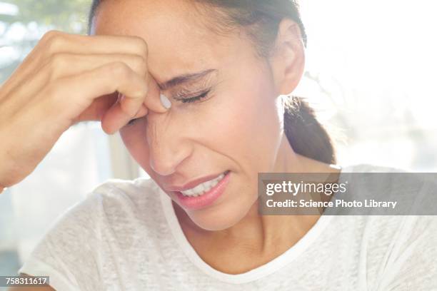 woman with tension headache - sinusitis stock pictures, royalty-free photos & images