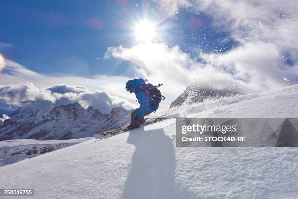 "germany, bavaria, zugspitz arena, man skiing off-piste" - zugspitze mountain stock pictures, royalty-free photos & images