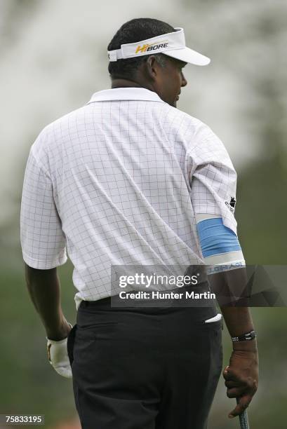 Vijay Singh of Fiji wears a bandage on his elbow on the 17th hole during the second round of the Canadian Open at Angus Glen Golf Club on July 27,...