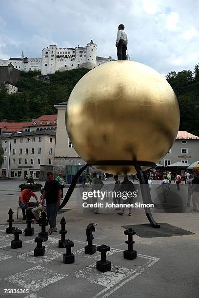 The sixth Salzburg festival art project "Sphaera" of the German artist Stephan Balkenhol is seen, situated in front of the Salzburg Cathedral prior...