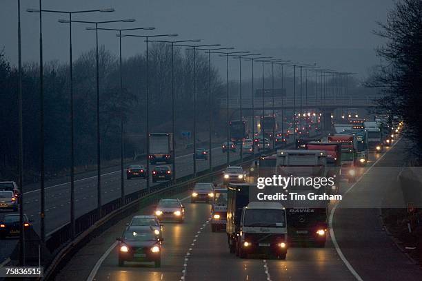 Lorry overtaking southbound traffic on M1 Motorway in Northampton, United Kingdom.