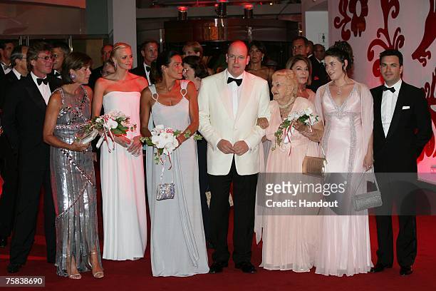 In this handout supplied by Realis/SBM, Prince Ernst August and Princess Caroline of Hanover, Charlene Wittstock, Princess Stephanie of Monaco,...