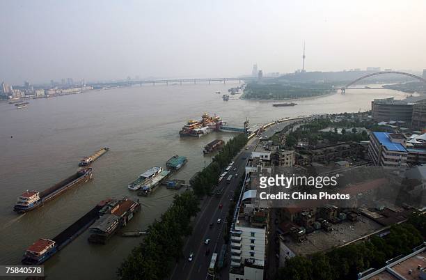 The elevated view of the river confluence where the Hanjiang River merges into the Yangtze River on July 28, 2007 in Wuhan of Hubei Province, central...