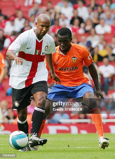 Inter Milan's French midfielder Olivier Dacourt and Valencia's Sunny battle for the ball during their Emirates Cup match at Arsenal FC's Emirates...