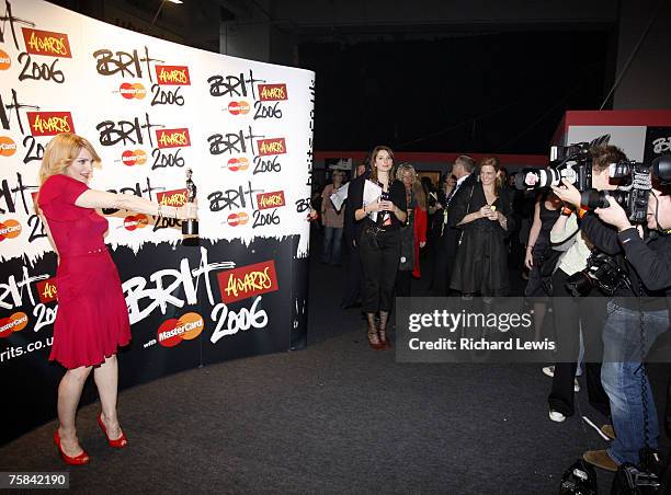 Madonna with her Brit Award for Best International Female Artist