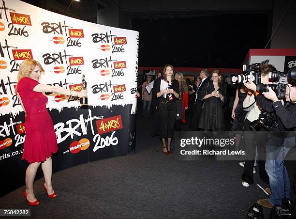 Madonna with her Brit Award for Best International Female Artist