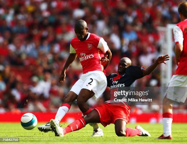 Zoumana Camara of Paris Saint-Germain tackles Abou Diaby of Arsenal during the 'Emirates Cup' match between Arsenal and Paris St Germain at the...