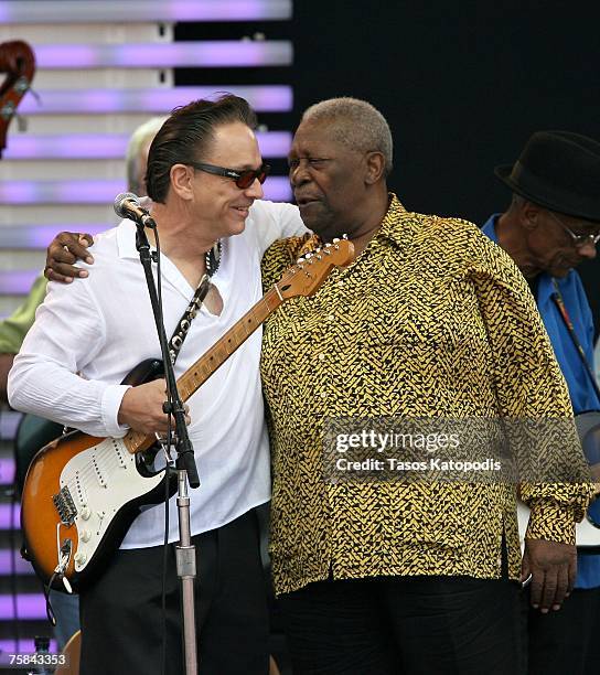 Musician B.B. King hugs musician Jimmie Vaughan following his performance at the Crossroads Guitar Festival 2007 held at Toyota Park on July 28, 2007...
