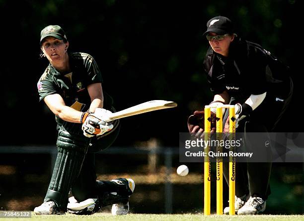 Melissa Bulow of Australia sweeps during the fifth Rose Bowl Series match between the Australia Southern Stars and the New Zealand White Ferns at...