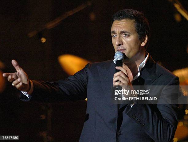 Franch singer Dany Brillant performs during the 43rd International Carthage Festival, 28 July 2007 at the Roman amphitheatre in Carthage, near Tunis....