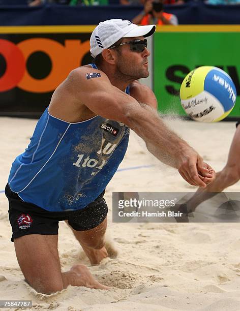 Andrew Schacht of Australia digs the ball during the semi final between Andrew Schacht and Josh Slack of Australia and Igor Kolodinsky and Dmitri...