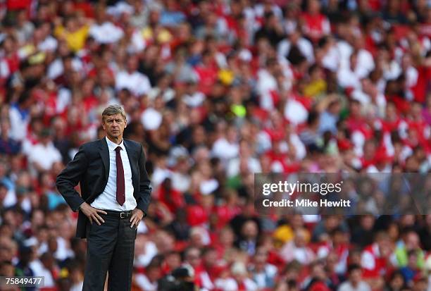 Arsene Wenger, manager of Arsenal, watches from the touchline during the 'Emirates Cup' match between Arsenal and Inter Milan at the Emirates Stadium...