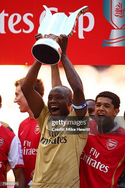 William Gallas of Arsenal lifts the Emirates trophy after the 'Emirates Cup' match between Arsenal and Inter Milan at the Emirates Stadium on July...