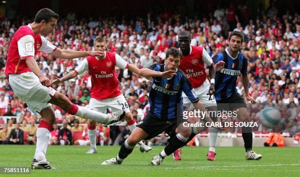 Arsenal's Robin Van Persie scores the second goal of the match during their Emirates Cup football match against Inter Milan at the Emirates Stadium,...