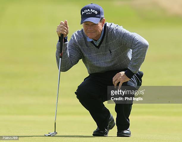 Tom Watson of the US lines up a putt during the final round of the Senior Open Championship held at the Honourable Company of Edinburgh Golfers,...