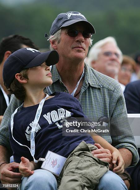 Movie star Richard Gere and son Homer watch the Baseball Hall of Fame induction ceremony on July 29, 2007 at Clark Sports Center in Cooperstown, New...