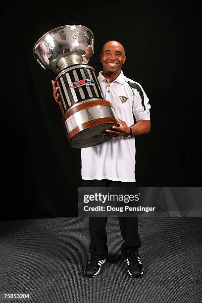 Head coach Darren Arbet of the San Jose SaberCats poses for a portrait with the Foster ArenaBowl trophy after the SaberCats 55-33 victory against the...