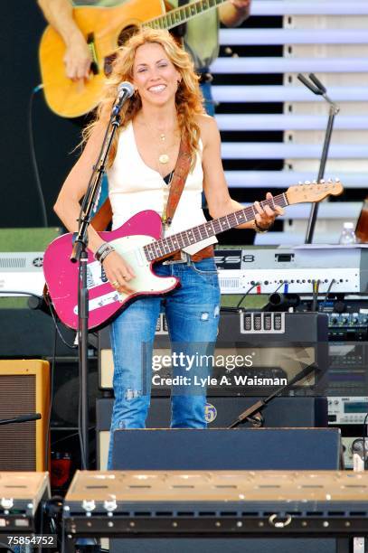 Sheryl Crow peforms at Eric Clapton's Crossroads Guitar Festival 2007 to benefit the Crossroads Centre in Antigua July 28, 2007 in Bridgeview,...