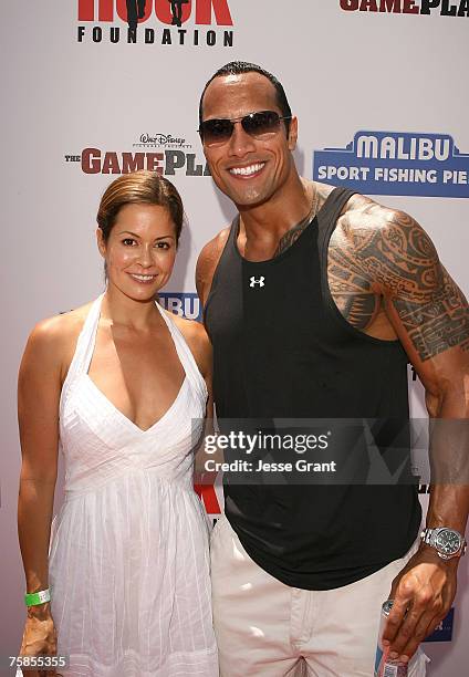 Actress Brooke Burke and actor Dwayne "The Rock" Johnson at the Summer on the Pier benefiting "The Rock" Foundation event at the Malibu Pier on July...