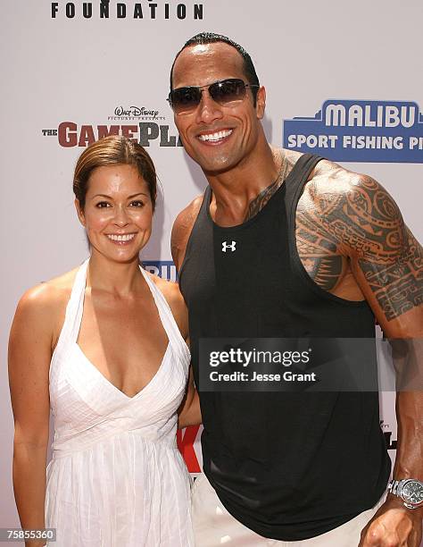 Actress Brooke Burke and actor Dwayne "The Rock" Johnson at the Summer on the Pier benefiting "The Rock" Foundation event at the Malibu Pier on July...