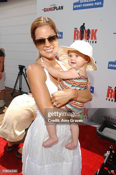 Actress Brooke Burke and daughter Rain Charvet arrive at the Summer On The Pier Benefiting "The Rock" Foundation Event on July 29, 2007 in Malibu,...