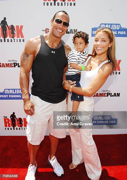 Actor Dwayne Johnson, J. Brandon and Actress Michael Michelle arrive at the Summer On The Pier Benefiting "The Rock" Foundation Event on July 29,...