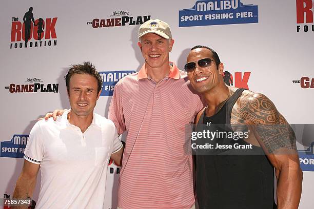 Actor David Arquette, Mitch Kupchak and Actor Dwayne "The Rock" Johnson at the Summer on the Pier benefiting "The Rock" Foundation event at the...