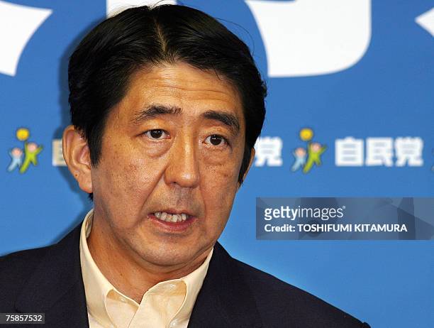 Japanese Prime Minister Shinzo Abe answers a question during his press conference following the July 29 upper house election at the party...
