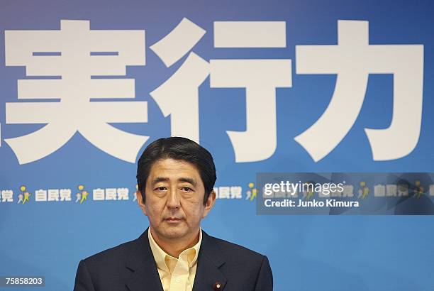 Japanese Prime Minister Shinzo Abe speaks at a press conference at the Liberal Democratic Party headquarters on July 30, 2007 in Tokyo, Japan....