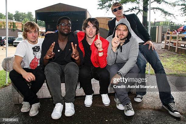 Plain White T's band members guitarists Dave Tirio , Mike Retondo and Tim Lopez , drummer De'Mar Hamilton and lead singer Tom Higgenson pose for...