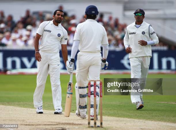 Zaheer Khan of India talks to Michael Vaughan of England as captain Rahul Dravid looks on during day four of the Second Test match between England...