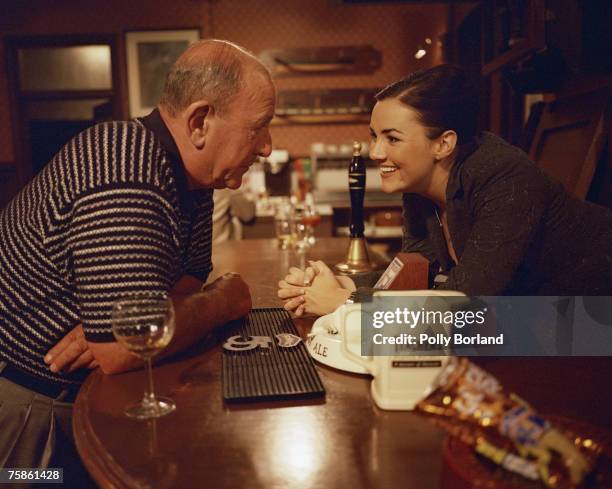 Mike Reid as Frank Butcher and Martine McCutcheon as Tiffany Raymond in the TV soap opera 'Eastenders', circa 1997.