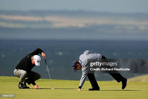 Mark O'Meara and Tom Watson of the USA on the 11th green during the final round of The Senior Open Championship 2007 at the Honourable Company of...