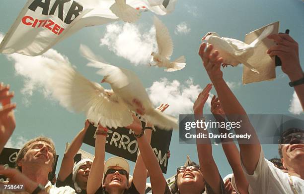 Group of International Peace activists release doves at an anti-Balikatan peace demonstration outside Edwin's Air Force Base in Zamboanga March 26,...