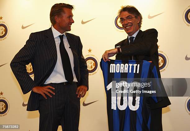 General Manager of Nike Italy Matthew Cook presents Inter Milan President Massimo Moratti with a personalised shirt during the Inter Milan Kit Launch...