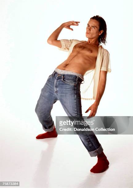 Actor River Phoenix poses at a photoshoot in a studio in Los Angeles, California. These were the last studio shot of River Phoenix who died on...