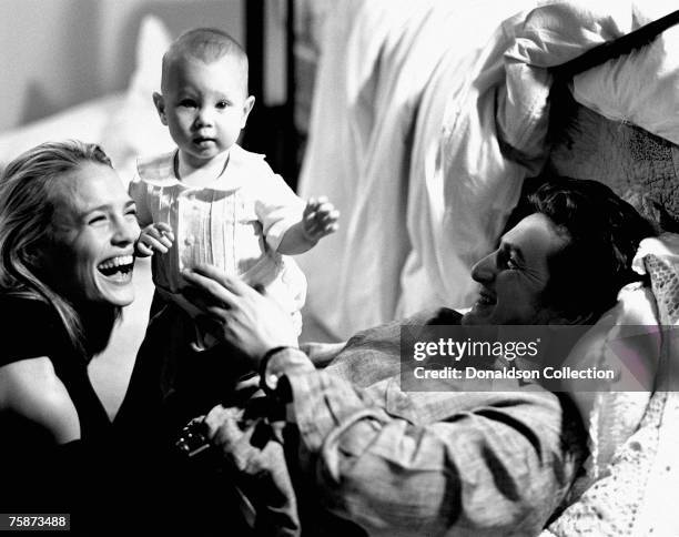 Actor Sean Penn and his girlfriend Robin Wright with their baby daughter Dylan at their residence in Malibu, California.