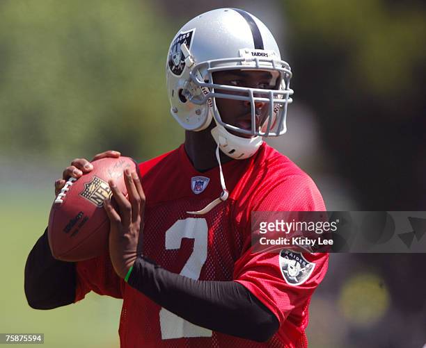 Oakland Raiders rookie quarterback JaMarcus Russell, the No. 1 pick in the 2007 NFL Draft, drops back to pass at minicamp at the Oakland Raiders...
