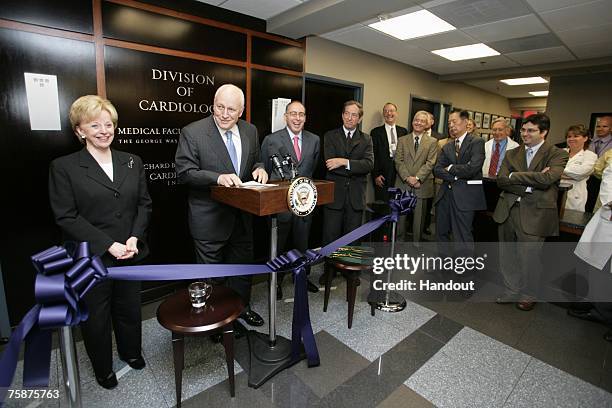 In this photo provided by the White House, U.S. Vice President Dick Cheney , joined by Mrs. Lynne Cheney, delivers remarks at a ribbon-cuttiing...