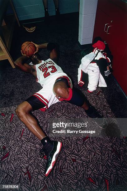 Michael Jordan of the Chicago Bulls celebrates winning the1996 NBA Championship after defeating the Seattle SupperSonics in Game Six of the NBA...