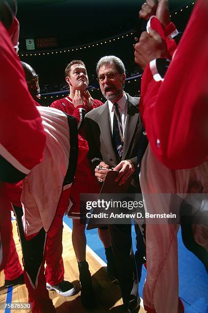 Chicago Bulls head coach Phil Jackson instructs his team during a 1996 NBA game. NOTE TO USER: User expressly acknowledges that, by downloading and...