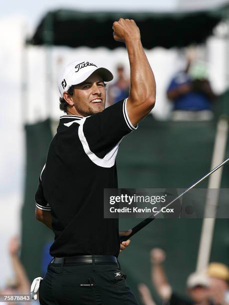 Adam Scott celebrates a par putt on the 18th green that gave him a two-shot victory in the final round of the 2007 Shell Houston Open Sunday, April 1...