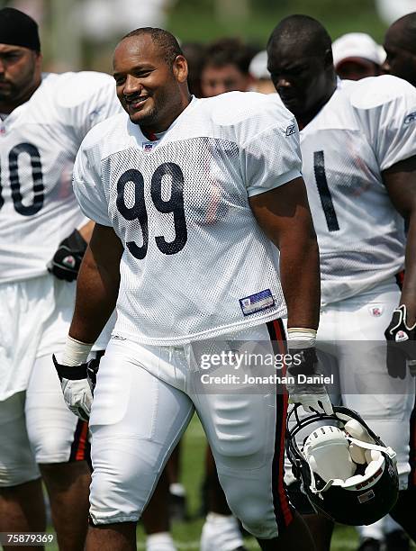 Darwin Walker of the Chicago Bears, traded to the Bears from the Buffalo Bills, walks out to the field before a summer training camp practice on July...