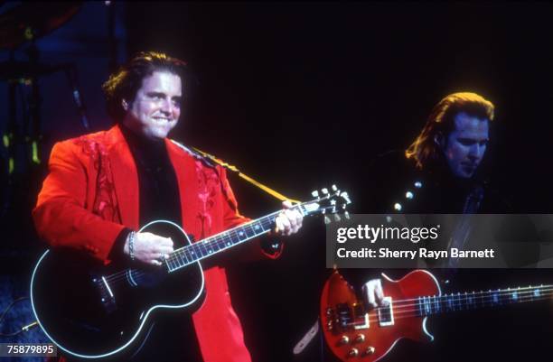 Raul Malo and Robert Reynolds of the country group The Mavericks perform at the MGM Grand Hotel in March 1995 in Las Vegas, Nevada.