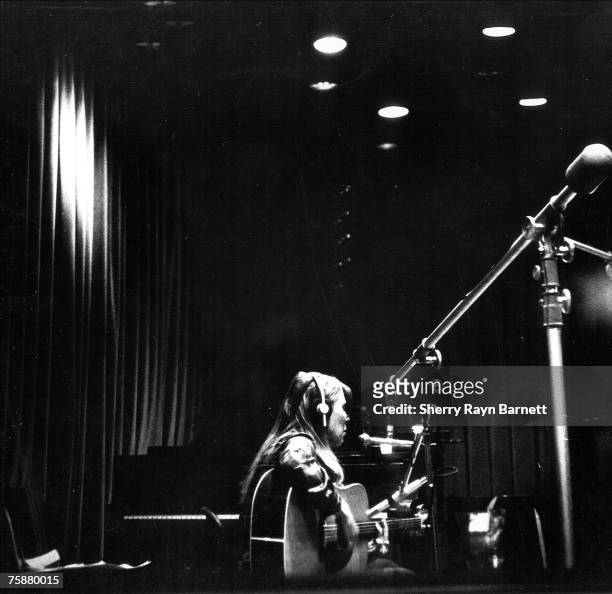 Singer songwriter Joni Mitchell records at A&M Studios in Los Angeles, California, 1973.