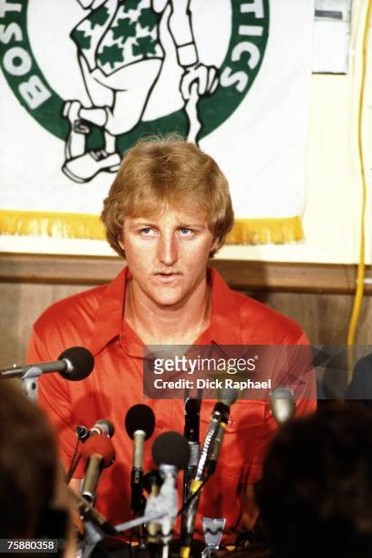 Larry Bird of the Boston Celtics talks with the media at his contract signing press conference circa 1979-1980 at the Boston Garden in Boston,...