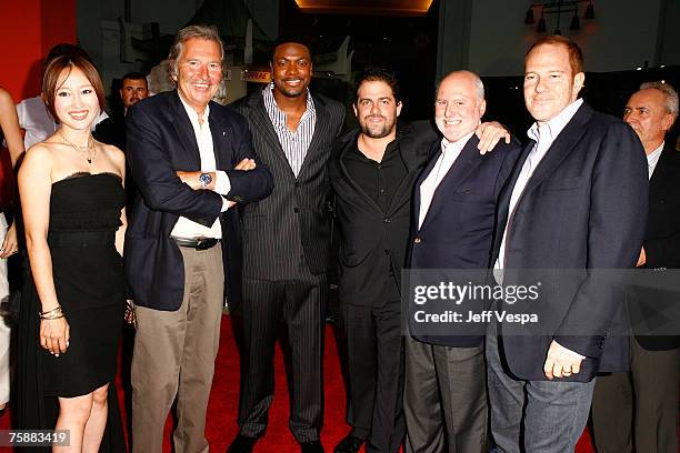 Actress Youki Kudoh , actor Chris Tucker , director Brett Ratner and guests arrive to the premiere of "Rush Hour 3" at Mann's Chinese Theater on July...