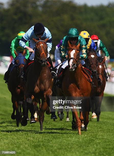 Tariq riden by Kerrin McEvoy leads to the finish in the Betfair Cup/Lennox Stakes run at Goodwood Racecourse on July 31 in Goodwood, England. Today...