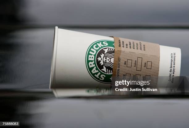 Starbucks cup is seen discarded on a newspaper rack July 31, 2007 in San Francisco, California. With dairy prices reaching record highs, Starbucks...
