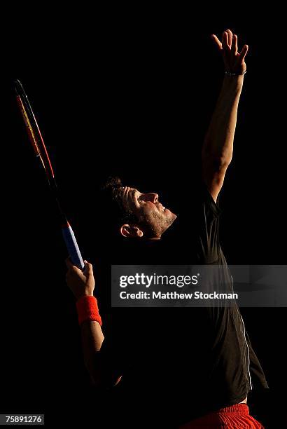 Wayne Odesnik serves to Adrian Garcia of Chile during the Legg Mason Tennis Classic at the William H.G. FitzGerald Tennis Center July 31, 2007 in...